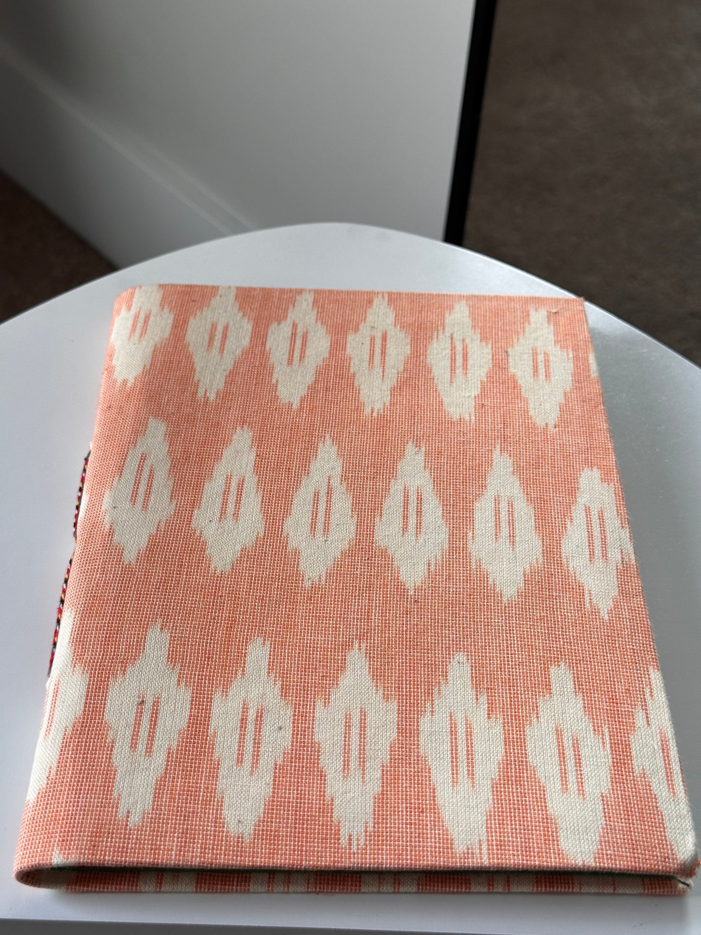 Peach ikat print fabric cover handmade paper notebook (9*7 in)