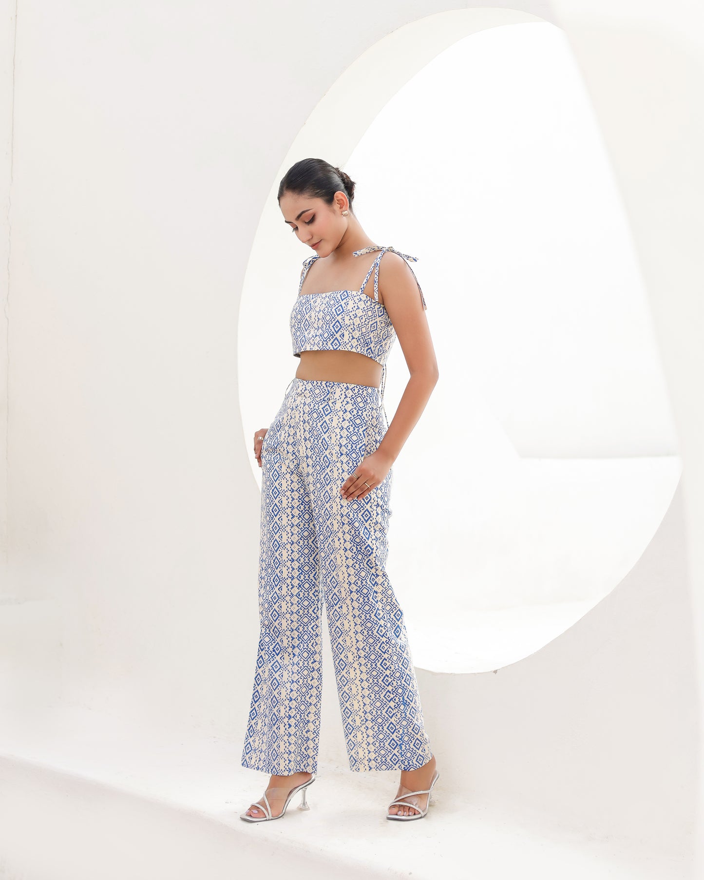 Aroa crop top and Marisa pant co-ord set in blue geometric block print, full-length studio shot