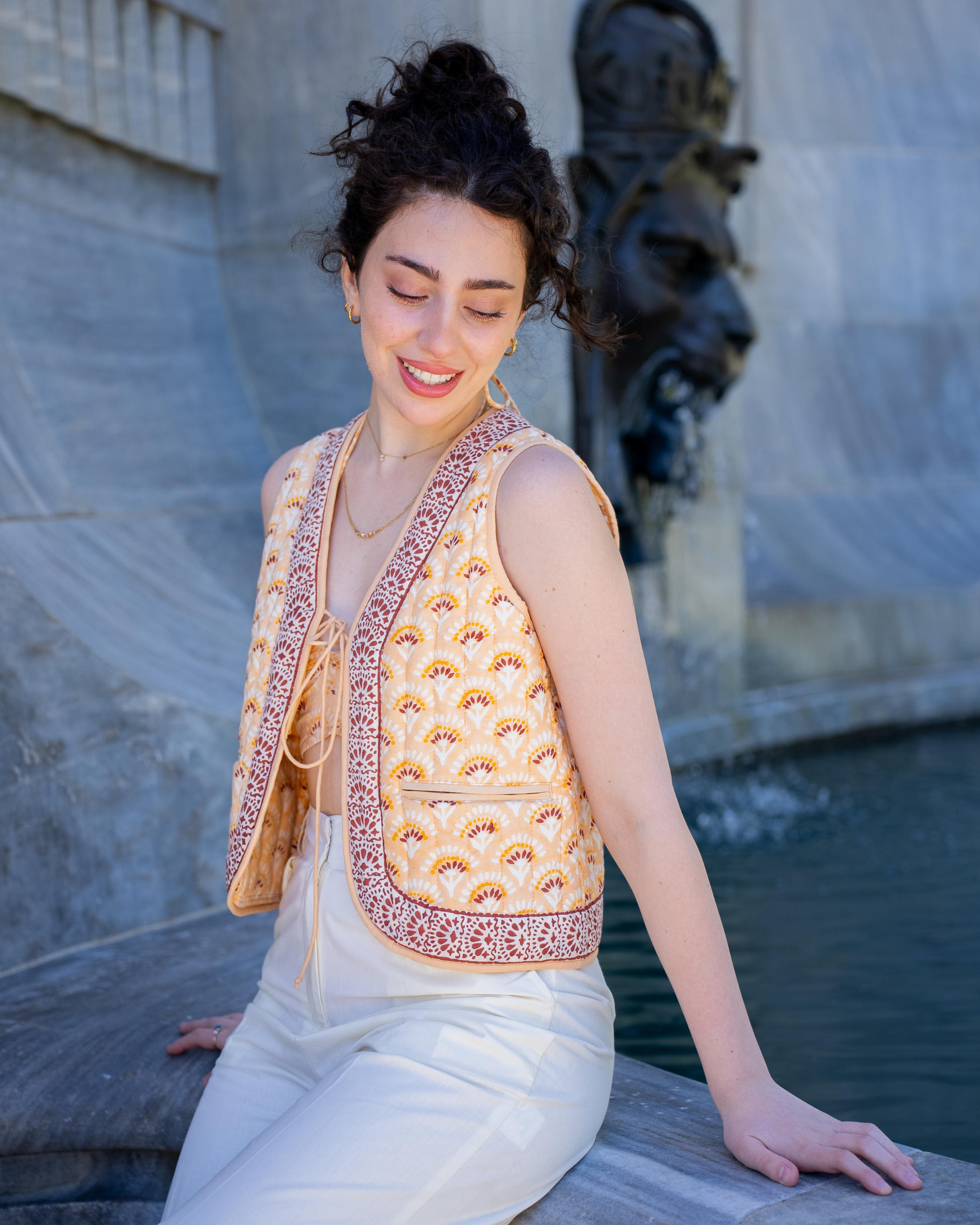 Boho Bay Half Sleeve Quilted Jacket – close-up lifestyle front view showing quilted block print and contrast border edging